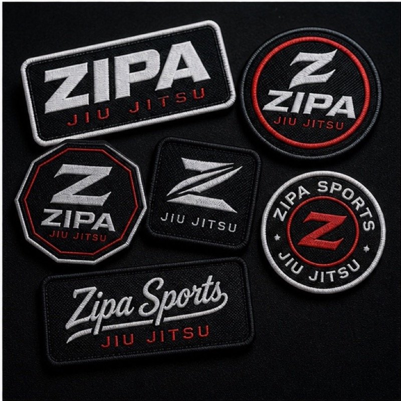 Custom embroidered BJJ gi patches with merrowed borders made by ZipaSports