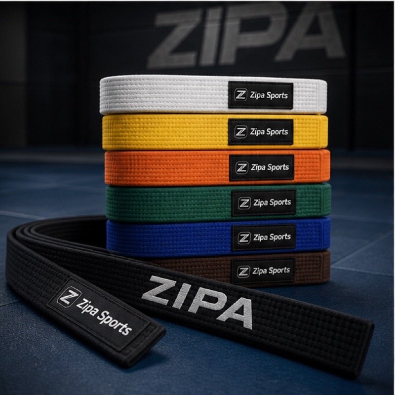 Custom judo grading belts including red and white dan panels by ZipaSports