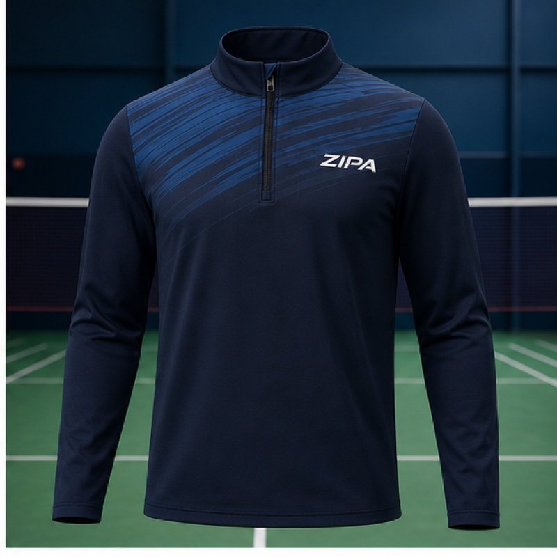 Custom badminton quarter-zip midlayer with embroidered crest manufactured by ZipaSports