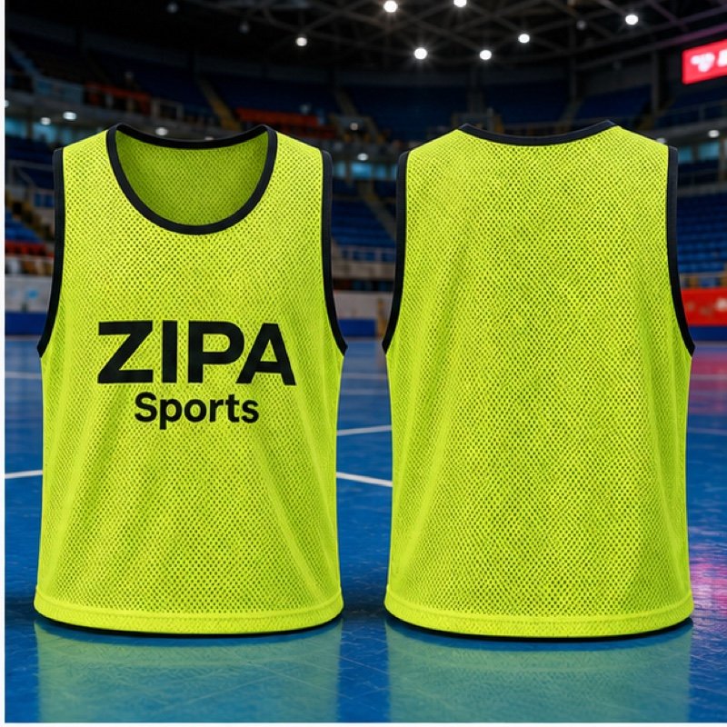 Custom fluorescent futsal training bibs with printed numbers manufactured by ZipaSports