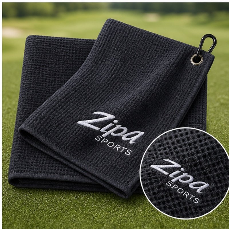 Custom sublimated golf towel with carabiner clip manufactured by ZipaSports