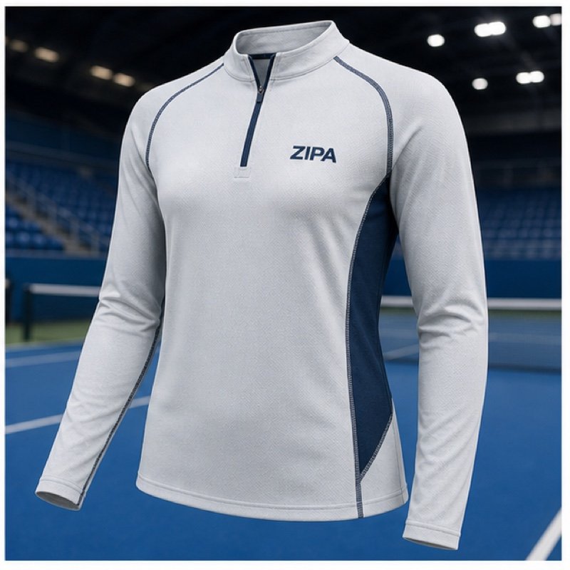 Custom long-sleeve tennis court top with sublimated sleeve panels manufactured by ZipaSports